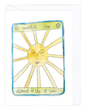 Greeting card with a sun illustration and text 'another trip around the sun' on a white background