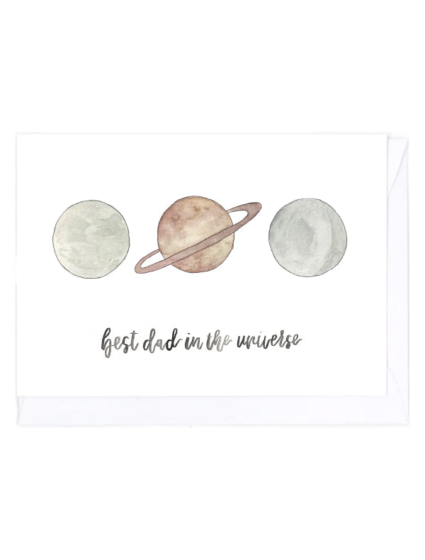 Greeting card with planets and 'best dad in the universe' text on a white background