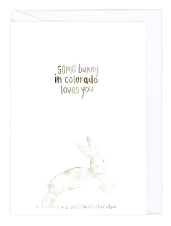 Greeting card with a bunny illustration and text 'Some bunny in Colorado loves you' on a white background