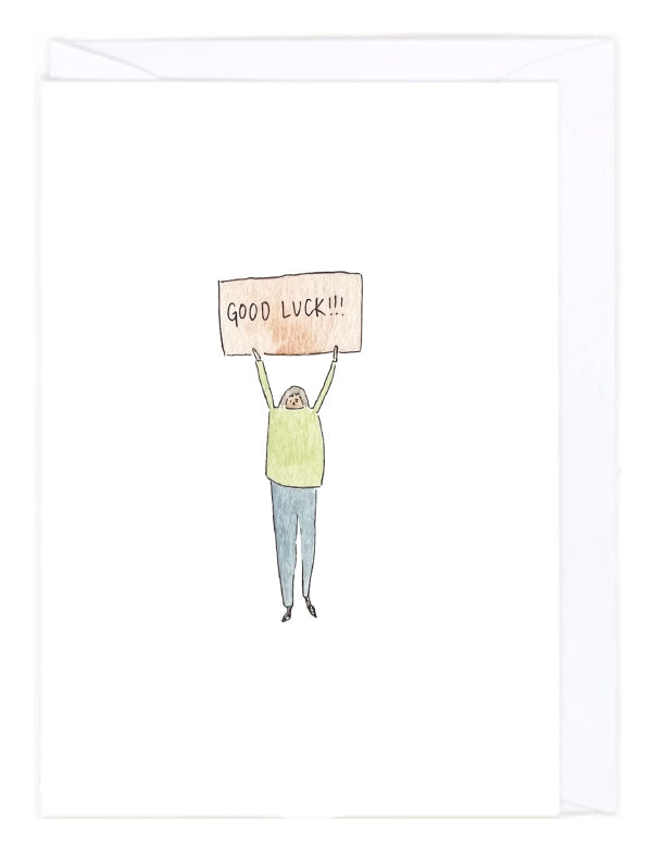 Greeting card with a person holding a 'GOOD LUCK!!' sign on a white background