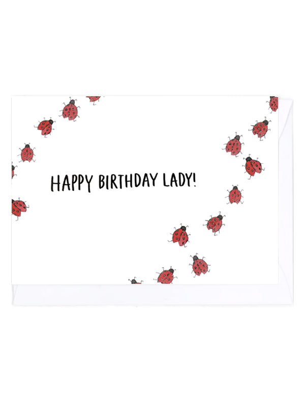 Greeting card with ladybug pattern and 'Happy Birthday Lady!' text on a white background