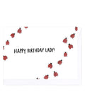 Greeting card with ladybug pattern and 'Happy Birthday Lady!' text on a white background