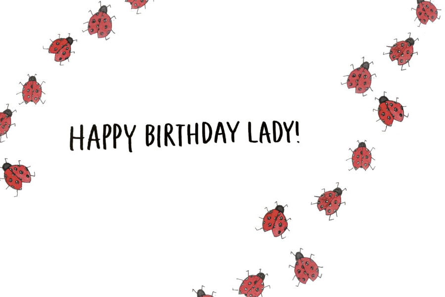 Greeting card with ladybug pattern and 'Happy Birthday Lady!' text on a white background