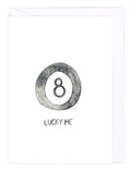 Greeting card with a watercolor illustration of an 8 ball with the text "Lucky me" on a white background. 