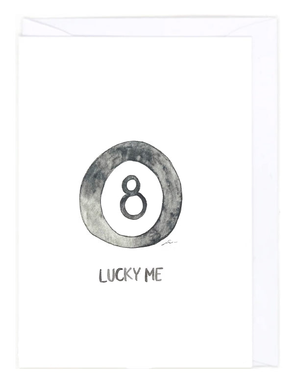 Greeting card with a watercolor illustration of an 8 ball with the text "Lucky me" on a white background. 
