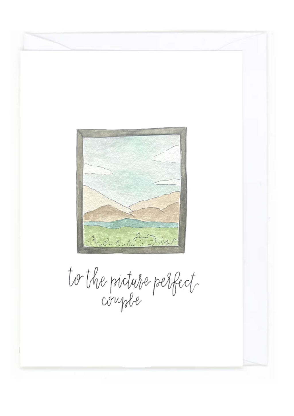 Framed artwork with a mountain landscape and text 'to the picture perfect couple' on a white background