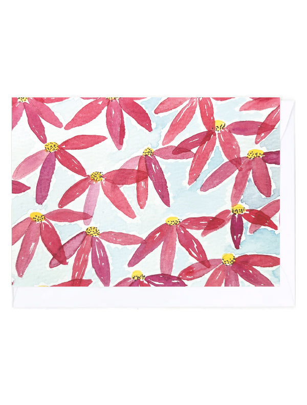 Watercolor floral patterned card with pink flowers on a white and blue background