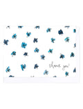 Greeting card with a pattern of blue flowers and 'thank you!' text on a white background