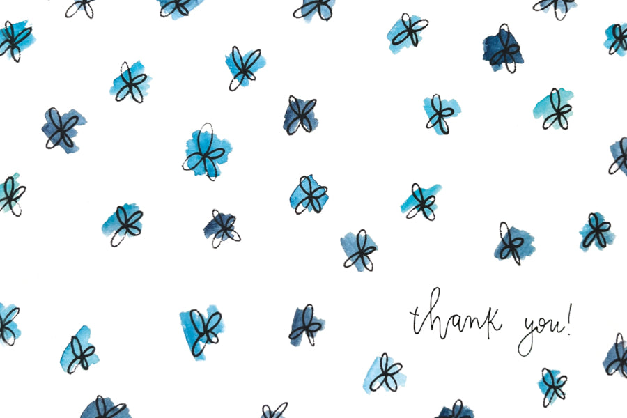 Pattern of blue flowers with 'thank you!' text on a white background